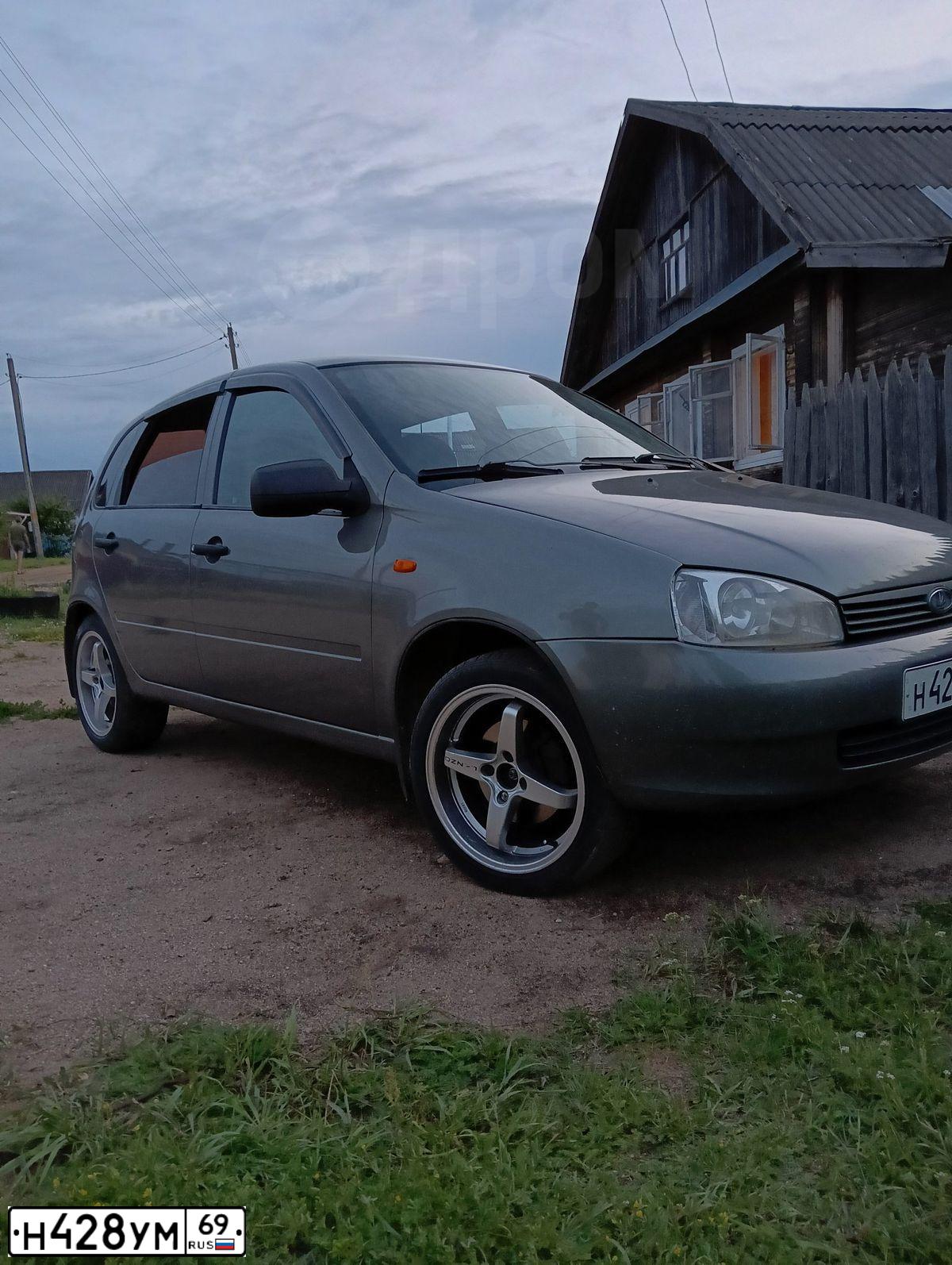 Фото автомобиля LADA 1119 KALINA, 2009 — госномер К004СХ69. Цвет: ТЕМНО-СЕРЫЙ МЕТАЛЛИК