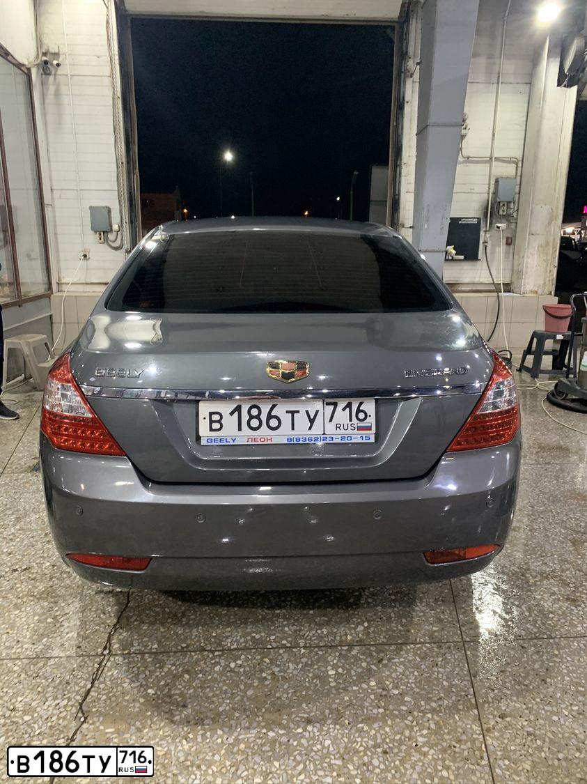 Фото автомобиля GEELY EMGRAND, 2014 — госномер М064АВ716. Цвет: СТАЛЬНОЙ (СЕРЫЙ)