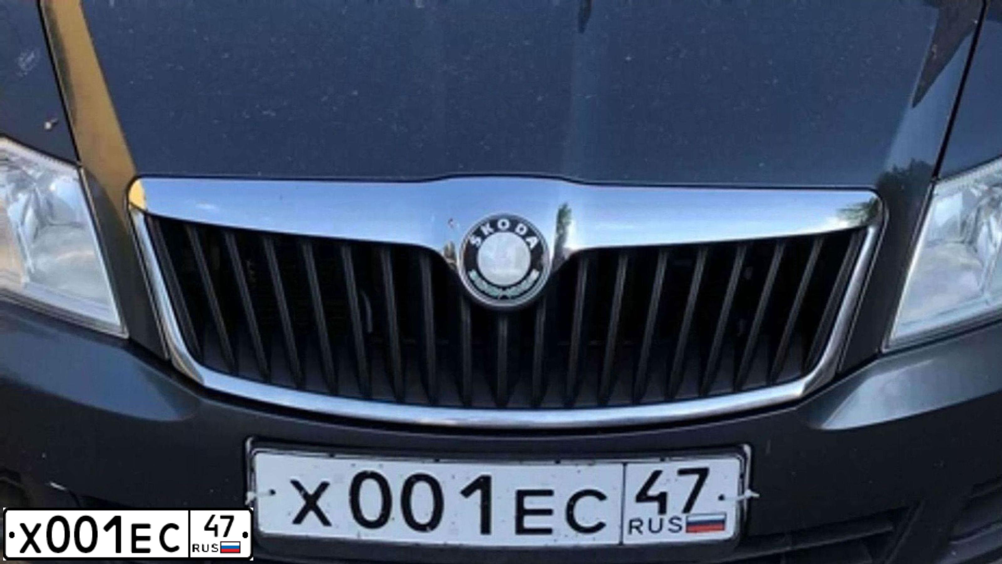Фото автомобиля SKODA OCTAVIA, 2009 — госномер Х001ЕС47. Цвет: ТЕМНО-СЕРЫЙ