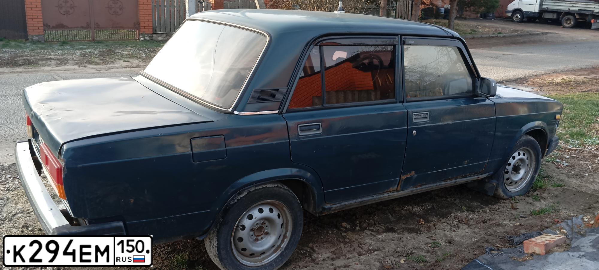 Фото автомобиля LADA 2107, 2007 — госномер К294ЕМ150. Цвет: Темно-зеленый
