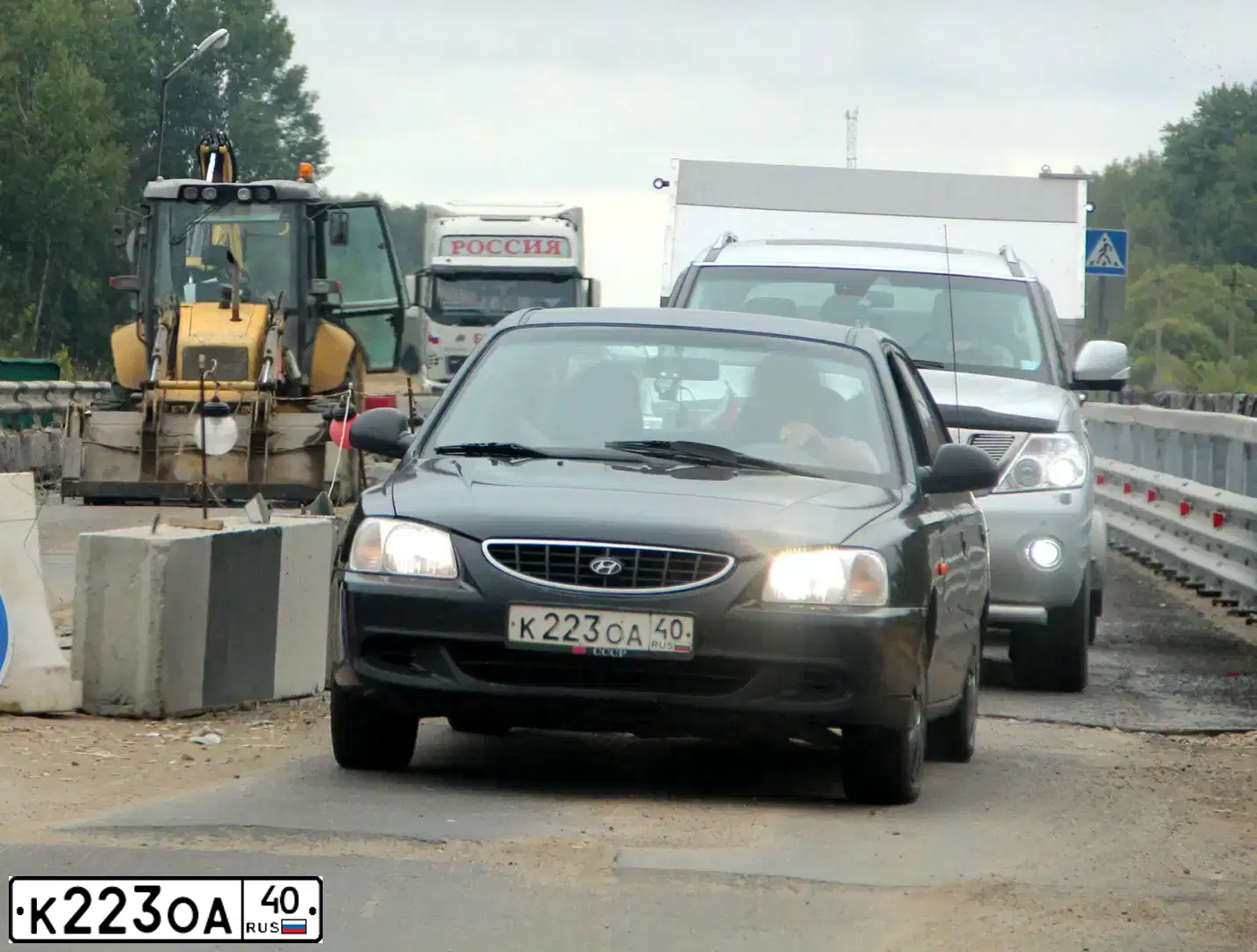 Фото автомобиля TAGAZ ACCENT, 2005 — госномер К223ОА40. Цвет: ЧЕРНЫЙ