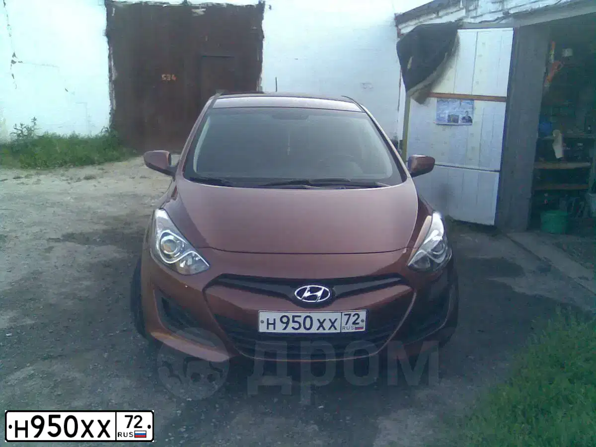 Фото автомобиля HYUNDAI I30, 2012 — госномер Н950ХХ72. Цвет: КОРИЧНЕВЫЙ