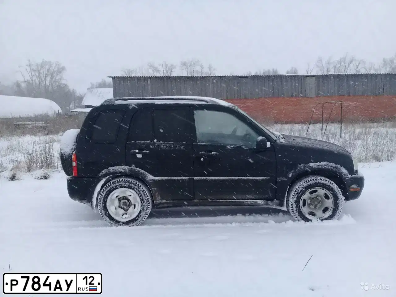 Фото автомобиля SUZUKI /GRAND/ VITARA, 2001 — госномер Е343ВТ21. Цвет: ЧЕРНЫЙ