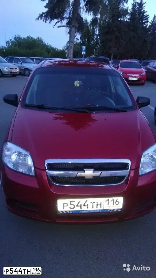 Фото автомобиля CHEVROLET AVEO, 2010 — госномер Р544ТН116. Цвет: Красный