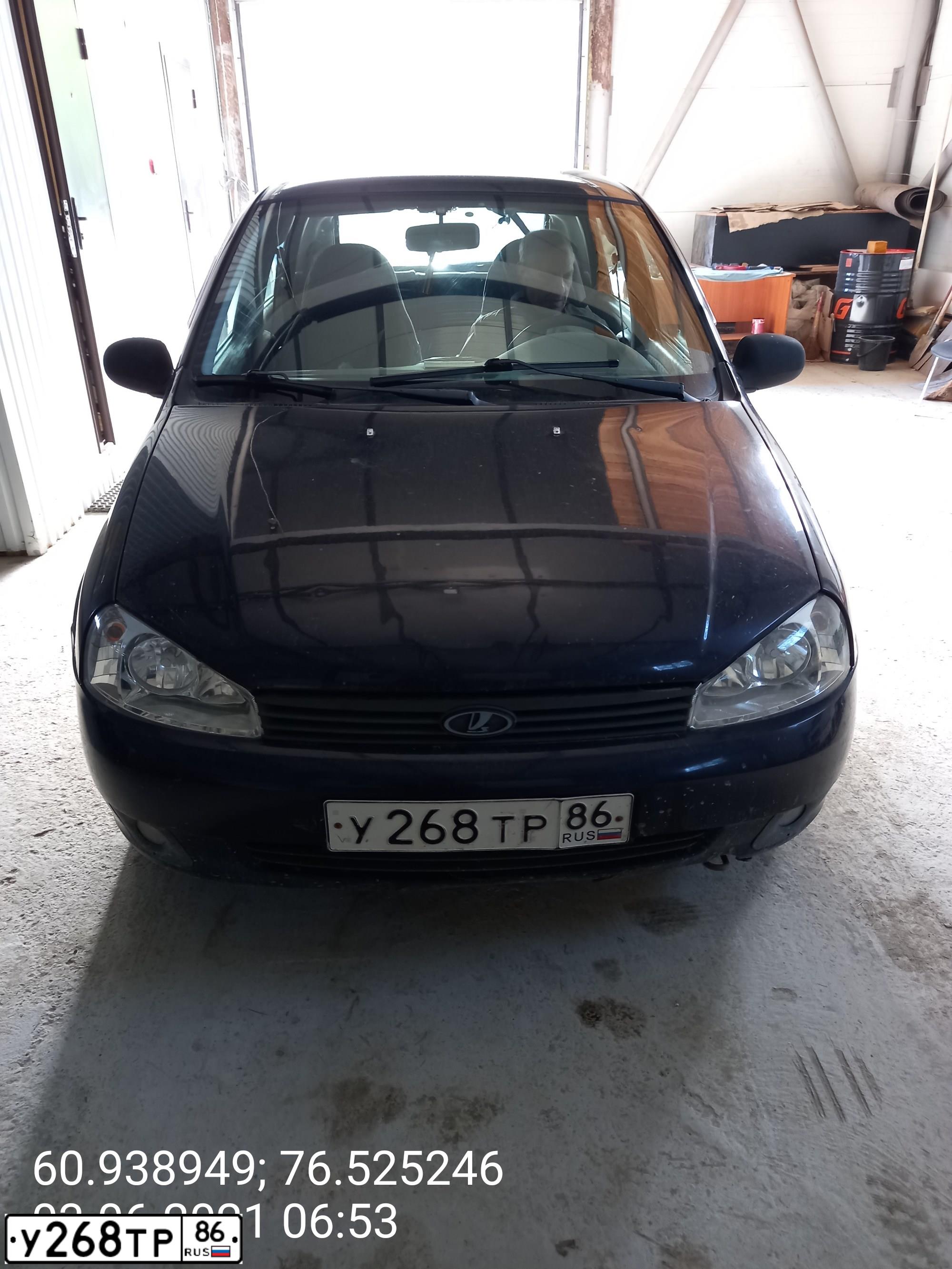 Фото автомобиля LADA KALINA, 2009 — госномер Е596СХ186. Цвет: СИНЕ-ФИОЛЕТОВЫЙ