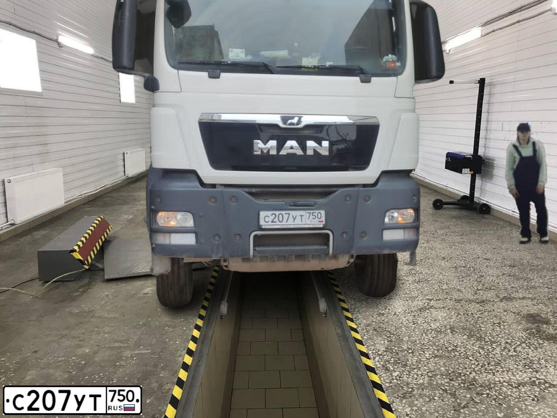 Фото автомобиля MAN N TGS 41.XXX 8X4, 2019 — госномер С207УТ750. Цвет: Белый