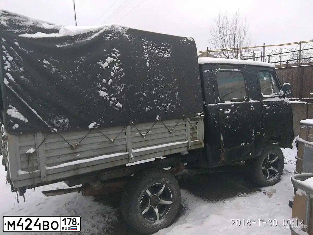 Фото автомобиля UAZ 3303, 1994 — госномер М424ВО178. Цвет: ЧЕРНЫЙ
