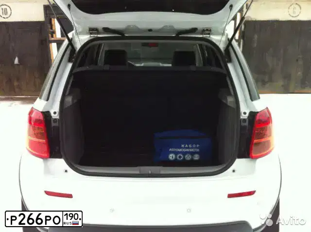 Фото автомобиля SUZUKI SX 4, 2011 — госномер Н404МЕ67. Цвет: Белый