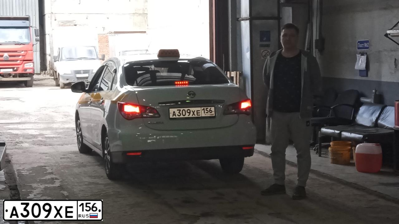 Фото автомобиля NISSAN ALMERA /AVTOVAZ/, 2018 — госномер М412ЕХ799. Цвет: БЕЛЫЙ ЖЕЛТЫЙ СЕРЫЙ