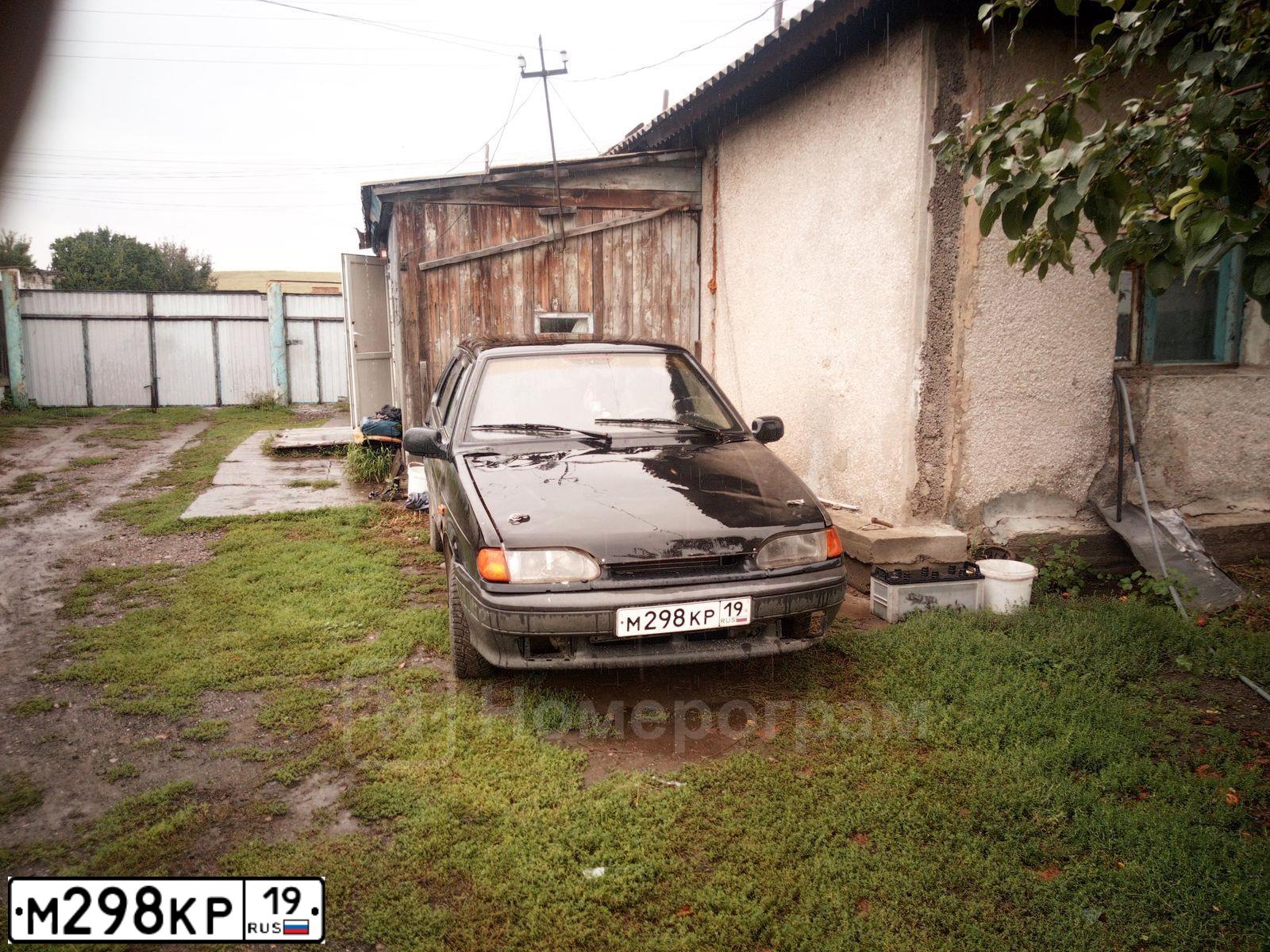 Фото автомобиля LADA 2115 SAMARA, 2004 — госномер М298КР19. Цвет: ЧЕРНЫЙ