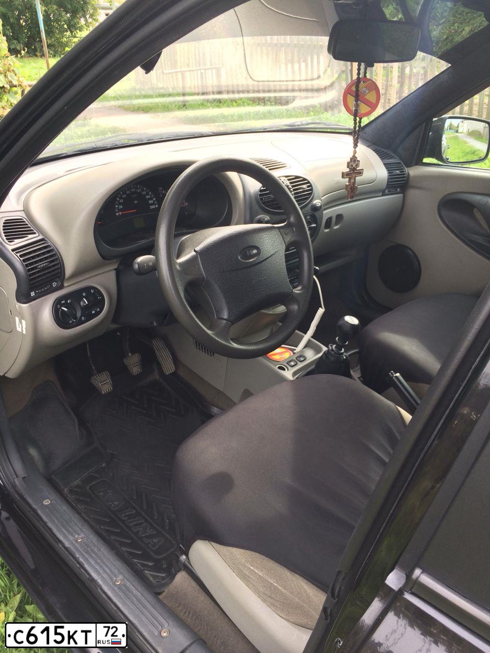 Фото автомобиля LADA 1119 KALINA, 2011 — госномер Х371КО72. Цвет: Сине-Черный