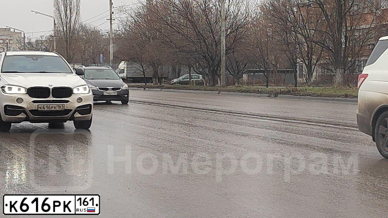Фото автомобиля VOLKSWAGEN TIGUAN, 2013 — госномер К616РК161. Цвет: Белый