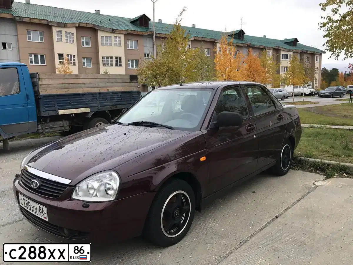 Фото автомобиля LADA 2170 PRIORA, 2012 — госномер В689ОВ89. Цвет: ТЕМНО-ВИШНЕВЫЙ