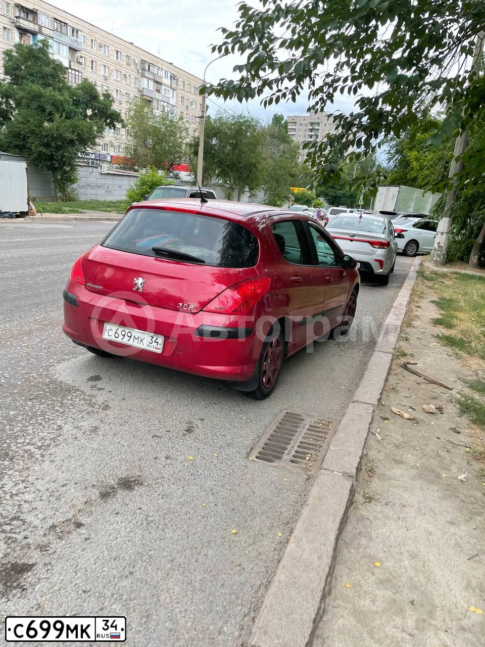 Фото автомобиля PEUGEOT 308, 2008 — госномер С699МК34. Цвет: Красный