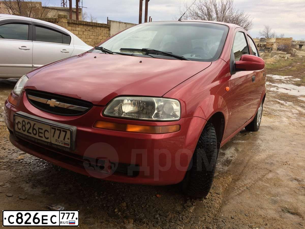 Фото автомобиля ШЕВРОЛЕ АВЕО, 2004 — госномер Х112АК185. Цвет: Красный