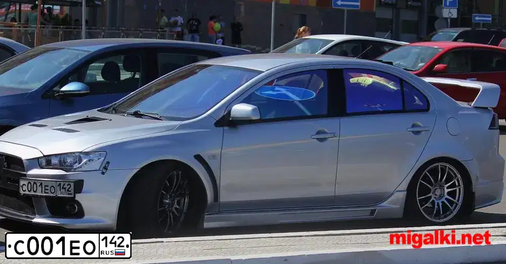 Фото автомобиля MITSUBISHI LANCER, 2012 — госномер У797ЕХ142. Цвет: Серебристый