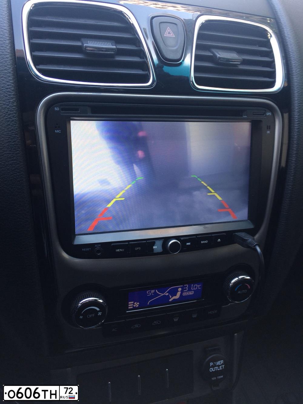 Фото автомобиля GEELY EMGRAND, 2013 — госномер О606ТН72. Цвет: Белый
