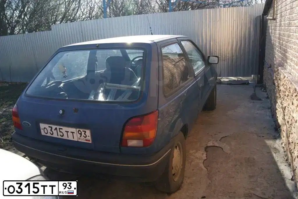 Фото автомобиля FORD FIESTA / ASPIRE, 1991 — госномер О372СО68. Цвет: ТЕМНО-СИНИЙ