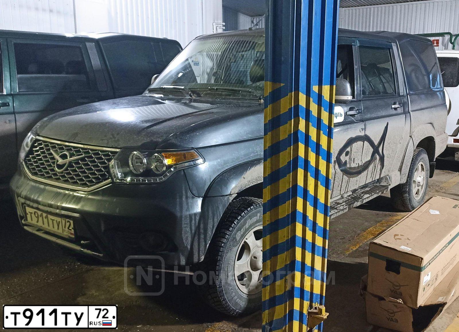 Фото автомобиля UAZ 2363 PICKUP, 2017 — госномер Т911ТУ72. Цвет: Темно-серый металлик