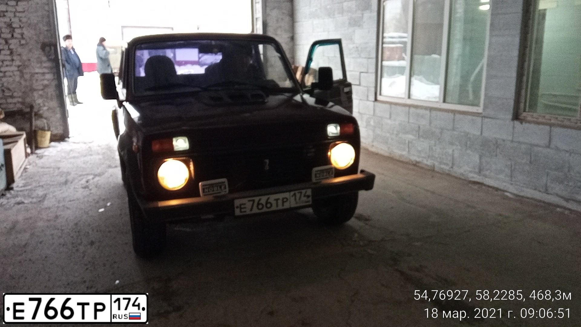 Фото автомобиля LADA 2121 NIVA, 2005 — госномер Е766ТР174. Цвет: ТЕМНО-ВИШНЕВЫЙ