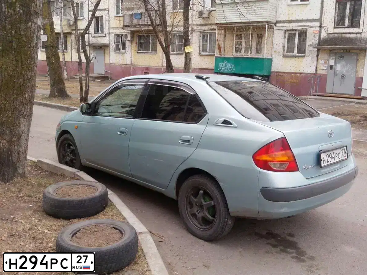 Фото автомобиля TOYOTA PRIUS, 1998 — госномер Н294РС27