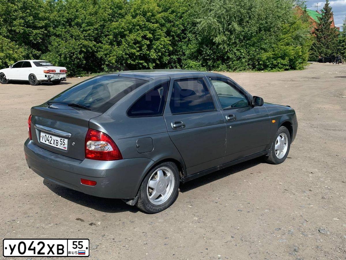 Фото автомобиля LADA PRIORA, 2011 — госномер Х143НУ142. Цвет: СРЕДНИЙ СЕРО-ЗЕЛЕНЫЙ МЕТАЛЛ