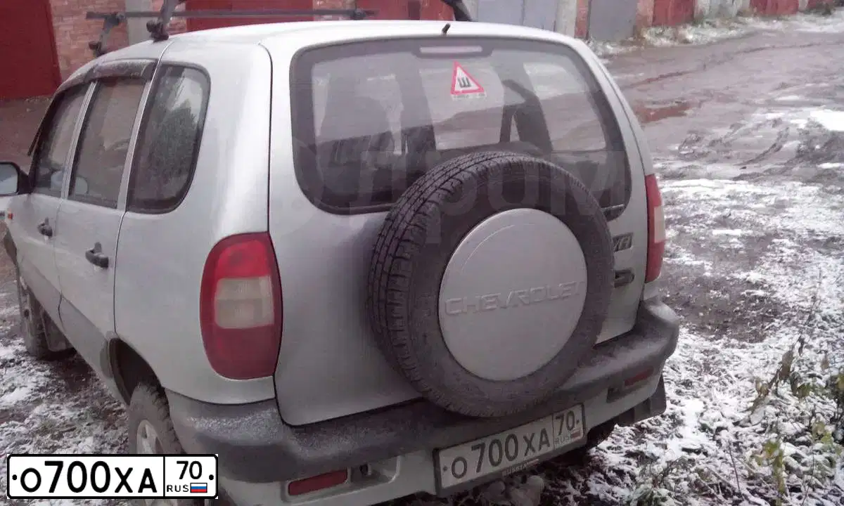 Фото автомобиля NISSAN PRIMERA, 2005 — госномер О700ХА70. Цвет: серебристый