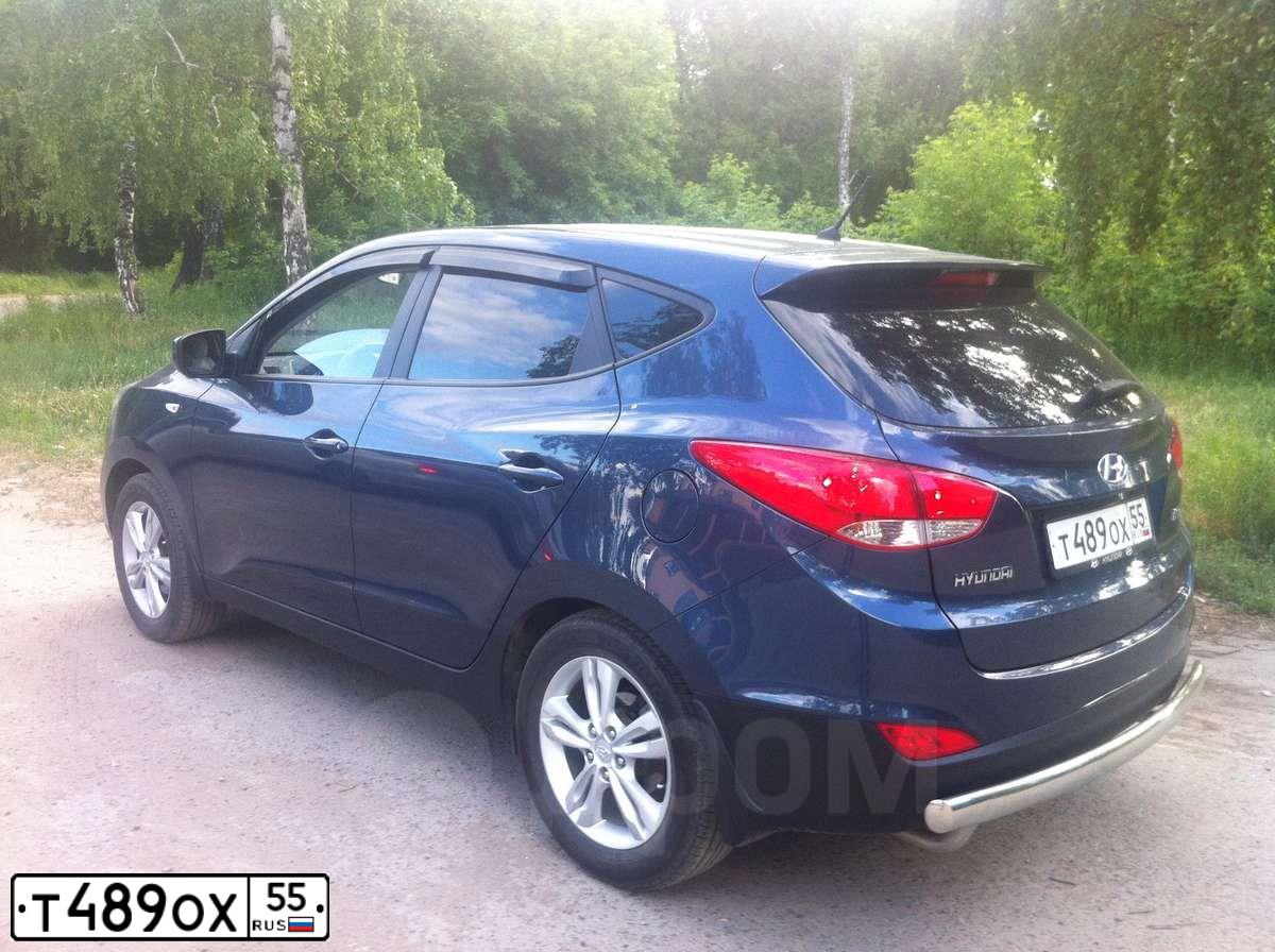 Фото автомобиля HYUNDAI IX35, 2010 — госномер Т489ОХ55. Цвет: ТЕМНО-СИНИЙ
