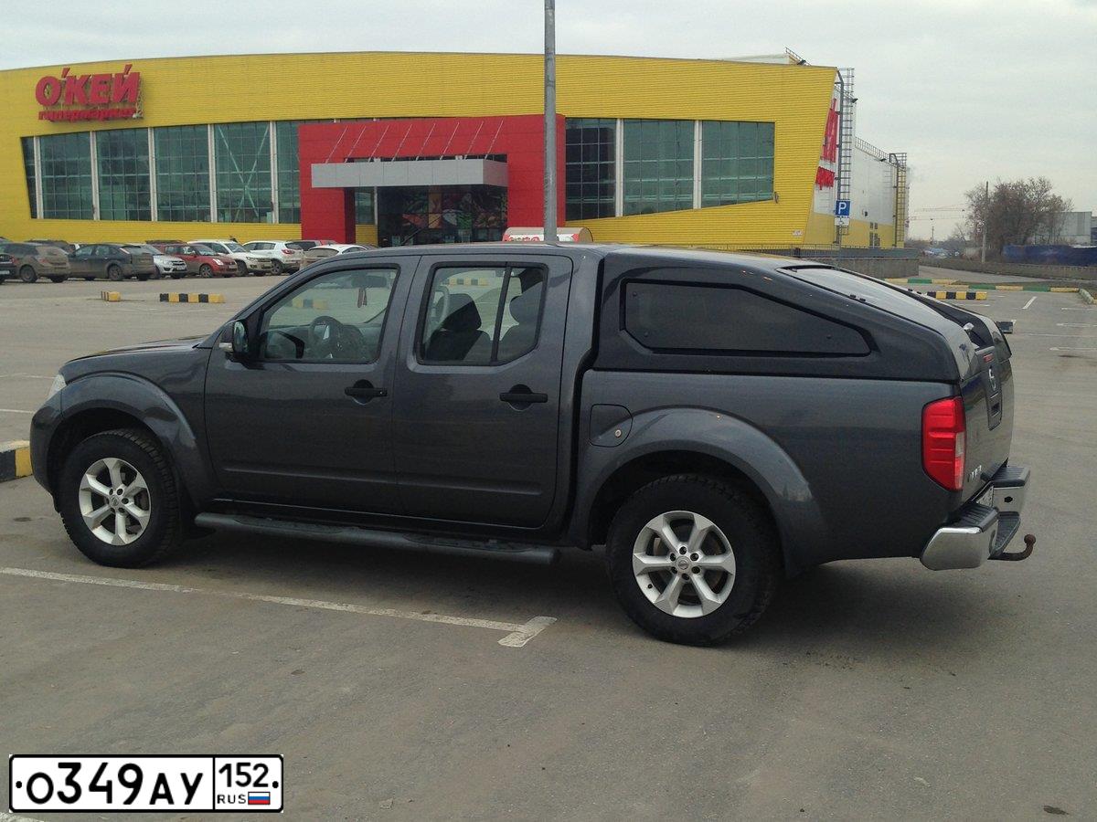 Фото автомобиля NISSAN NAVARA, 2011 — госномер О349АУ152. Цвет: СЕРО-ГОЛУБОЙ
