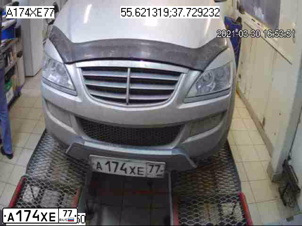 Фото автомобиля SSANGYONG KYRON, 2013 — госномер А174ХЕ77. Цвет: Серый