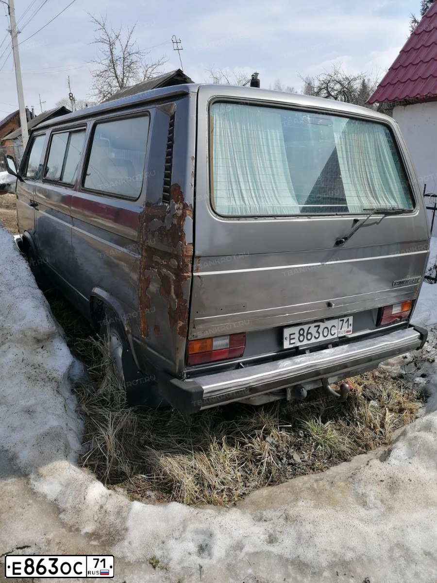Фото автомобиля VOLKSWAGEN CARAVELLE, 1983 — госномер Е863ОС71. Цвет: СЕРЫЙ