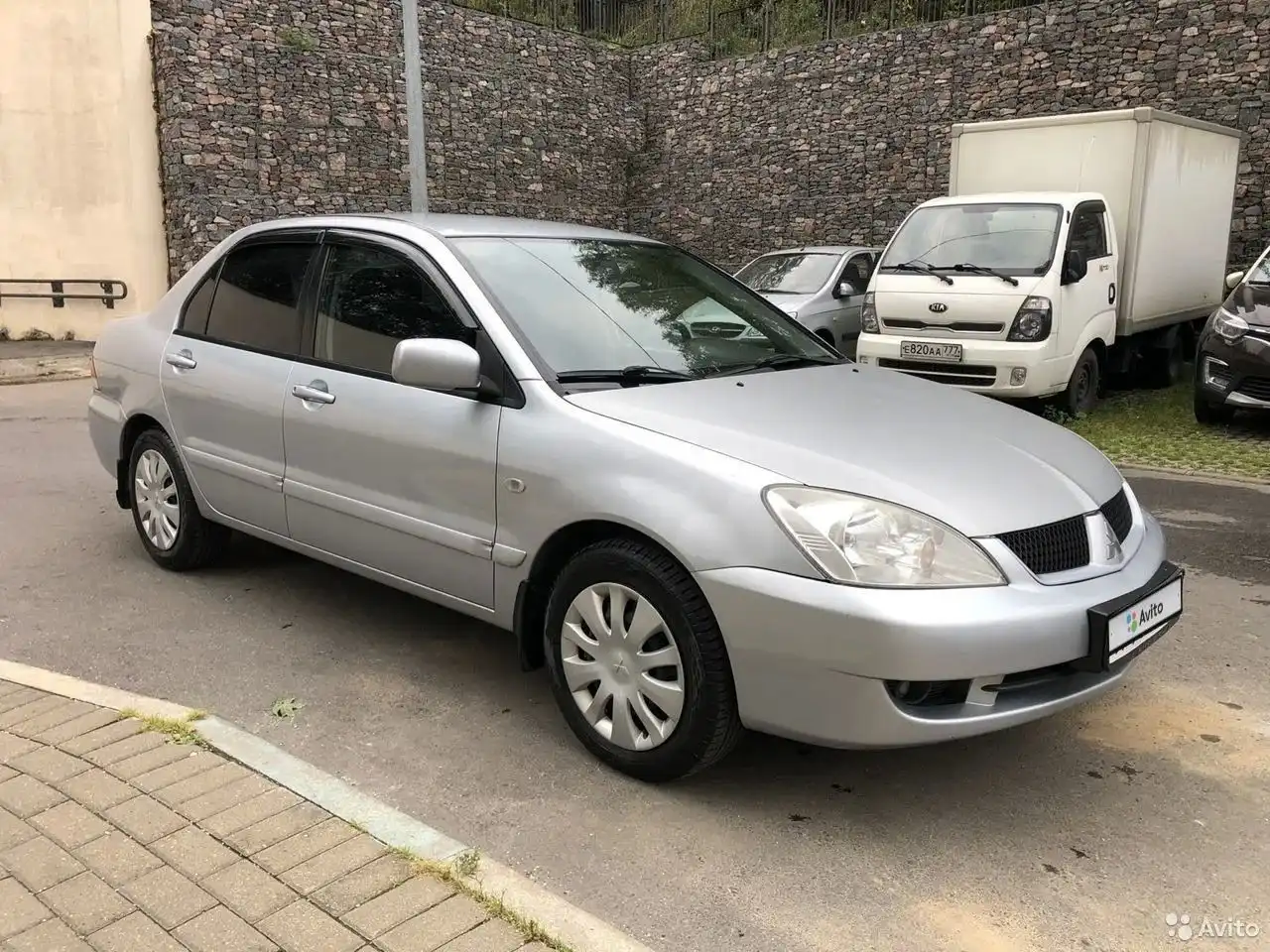 Фото автомобиля LADA LARGUS, 2018 — госномер О665НВ799. Цвет: БЕЛЫЙ