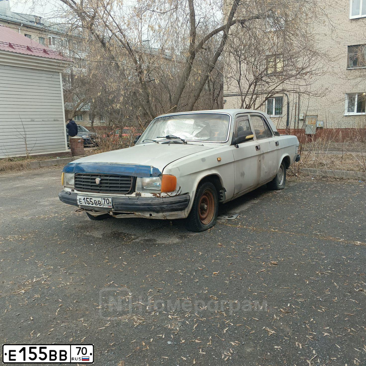 Фото автомобиля GAZ 3102 WOLGA, 1994 — госномер Е155ВВ70. Цвет: БЕЛЫЙ