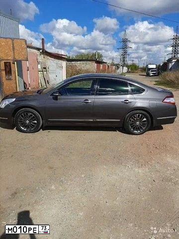 Фото автомобиля NISSAN TEANA, 2012 — госномер Р202КЕ73. Цвет: СЕРО-СИРЕНЕВЫЙ