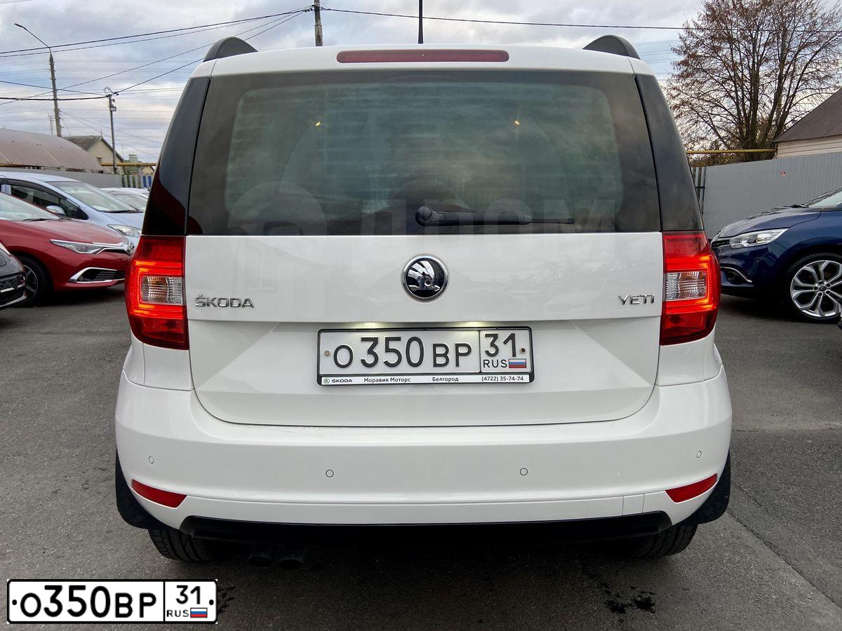 Фото автомобиля SKODA YETI, 2015 — госномер Т699ВМ774. Цвет: Белый