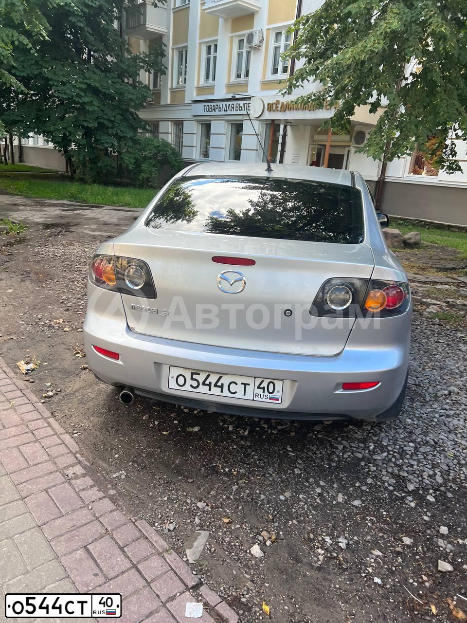 Фото автомобиля MAZDA 3, 2006 — госномер О544СТ40. Цвет: Серебристый