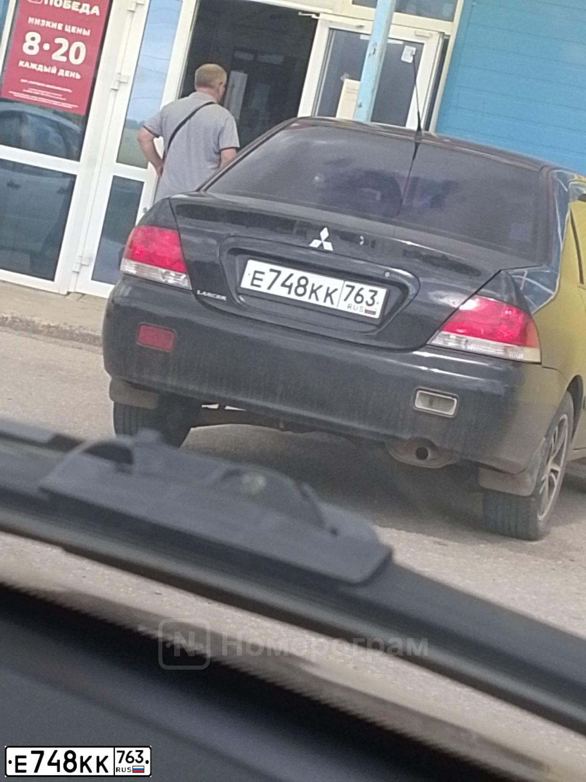 Фото автомобиля MITSUBISHI LANCER, 2007 — госномер С345КС56. Цвет: ЧЕРНЫЙ