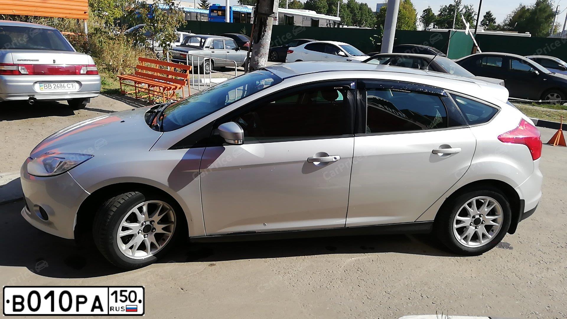 Фото автомобиля FORD FOCUS, 2012 — госномер Х816ТК763. Цвет: Серебристый