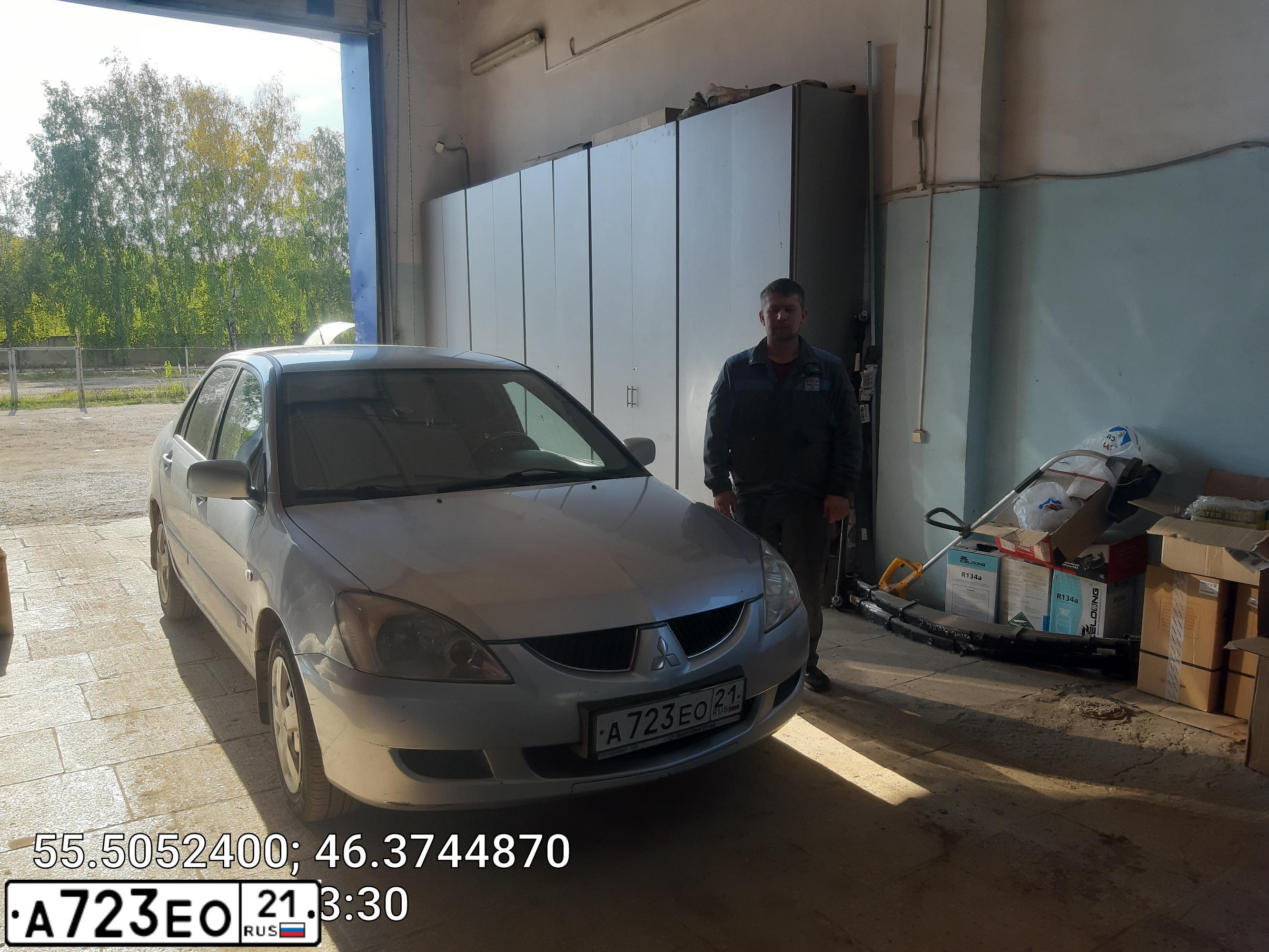 Фото автомобиля MITSUBISHI LANCER, 2004 — госномер А723ЕО21. Цвет: СВЕТЛО-СЕРЫЙ