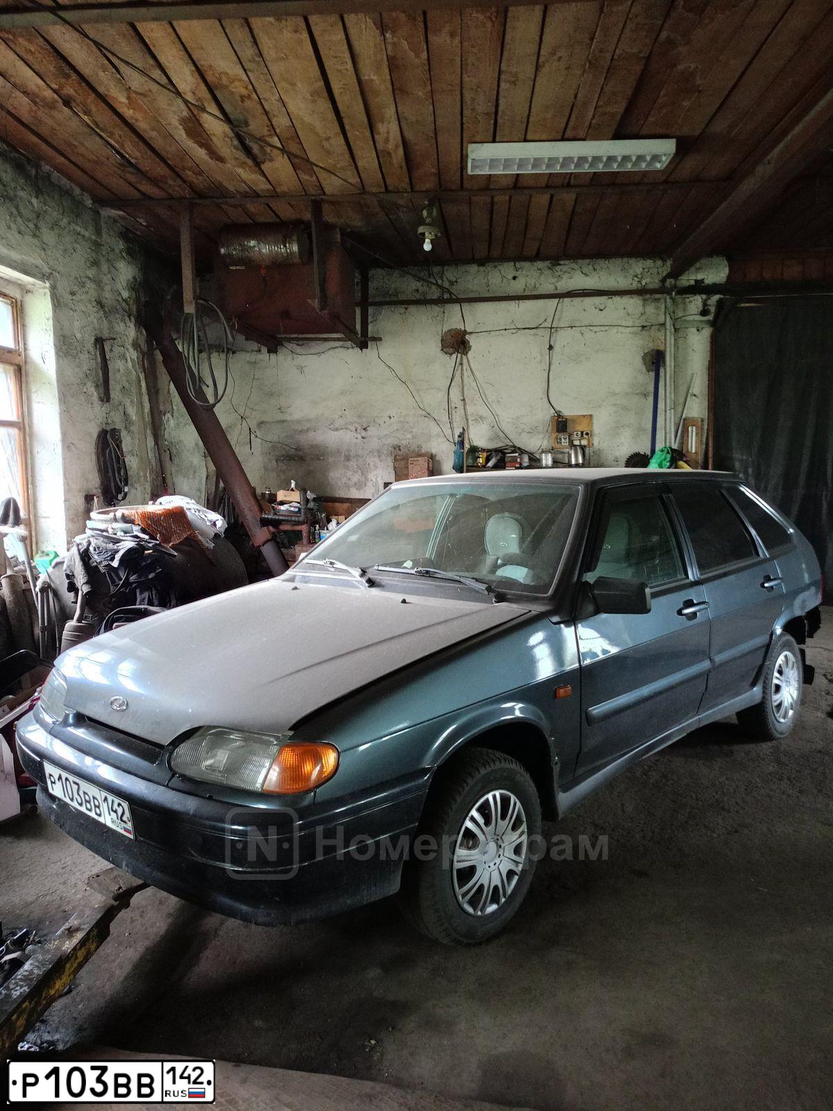 Фото автомобиля LADA 2114 SAMARA, 2012 — госномер Р103ВВ142. Цвет: СЕРО-СИНИЙ