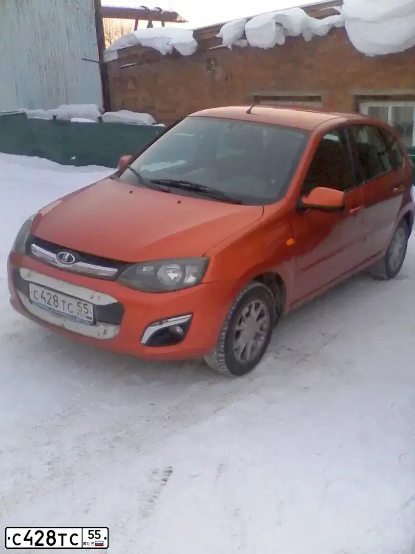 Фото автомобиля LADA 2192 KALINA, 2013 — госномер С428ТС55. Цвет: ОРАНЖЕВЫЙ