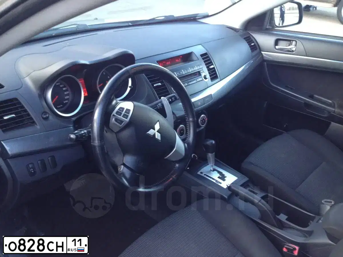 Фото автомобиля MITSUBISHI LANCER, 2008 — госномер У088УР18. Цвет: БЕЖЕВЫЙ