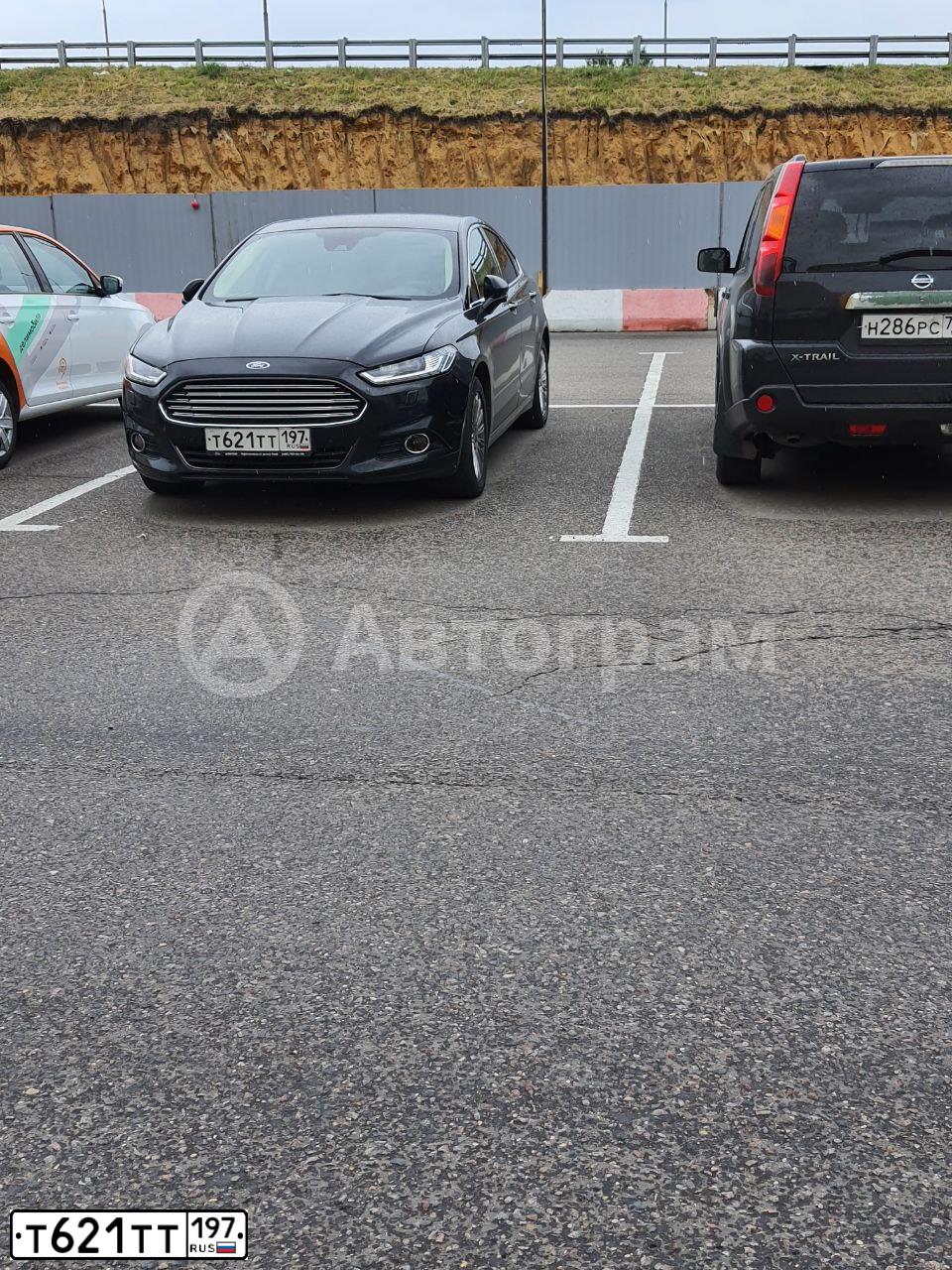 Фото автомобиля VOLKSWAGEN PASSAT, 2009 — госномер У124СВ799. Цвет: ЧЕРНЫЙ