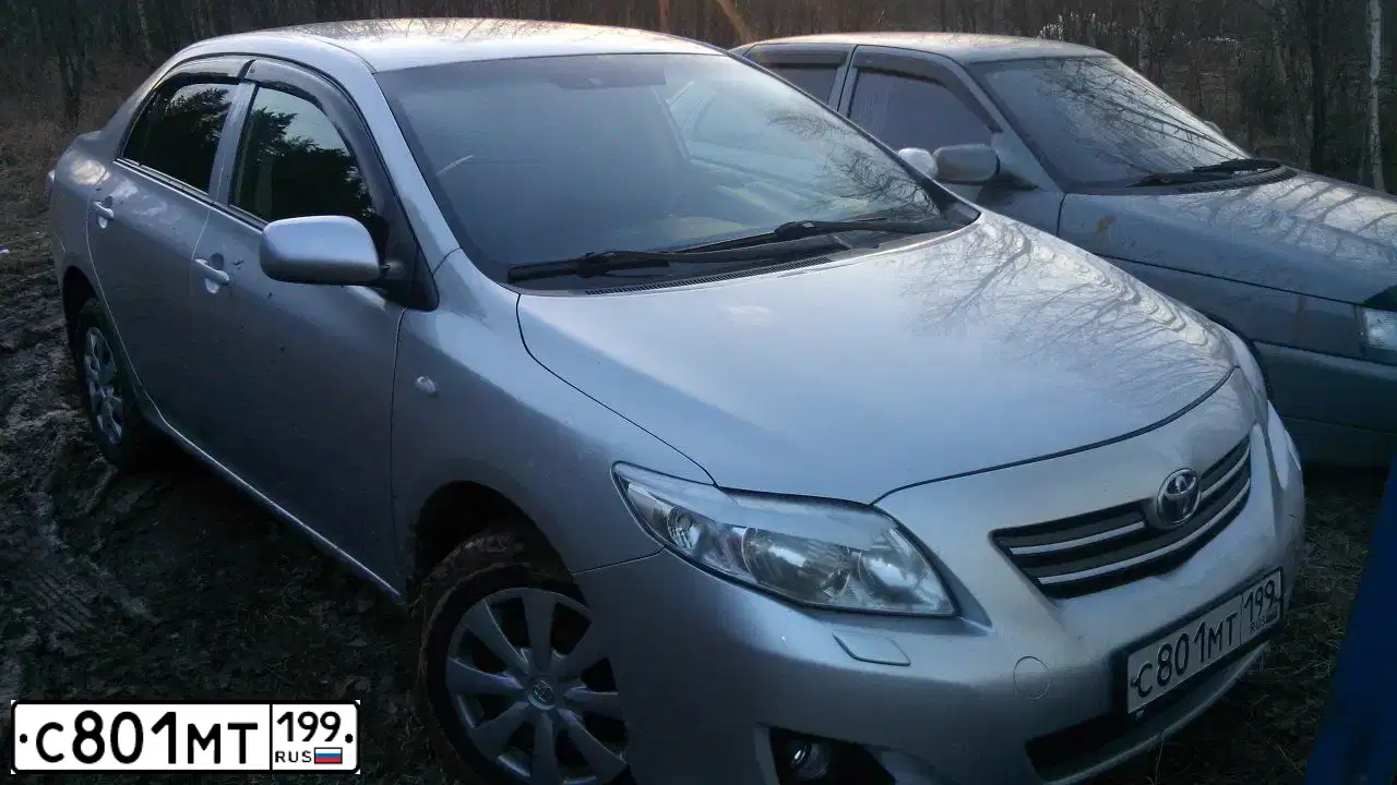 Фото автомобиля TOYOTA COROLLA, 2008 — госномер Н595ВМ57. Цвет: Серебристый