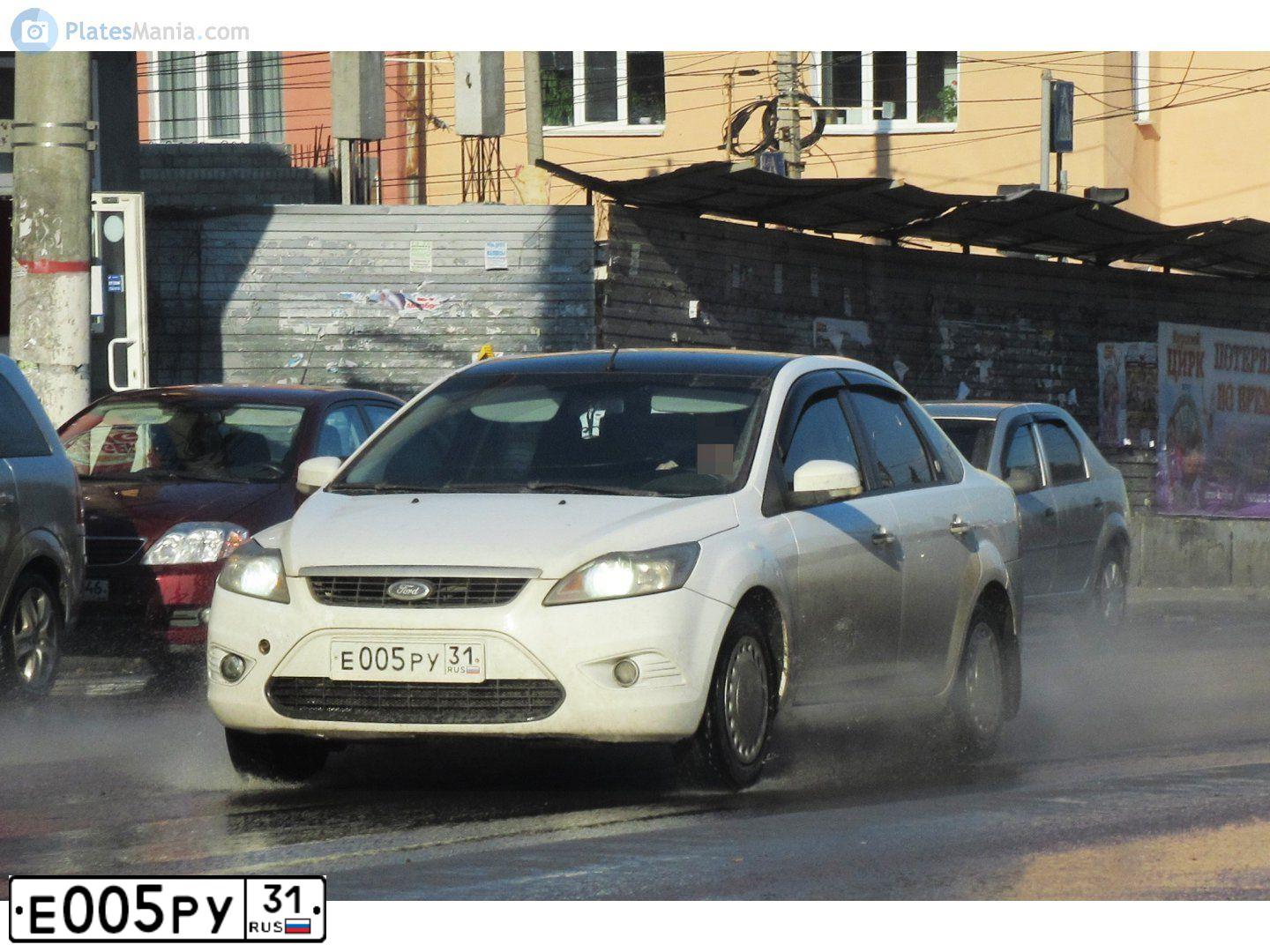 Фото автомобиля HONDA CR-V, 2000 — госномер Е005РУ31. Цвет: ЧЕРНЫЙ