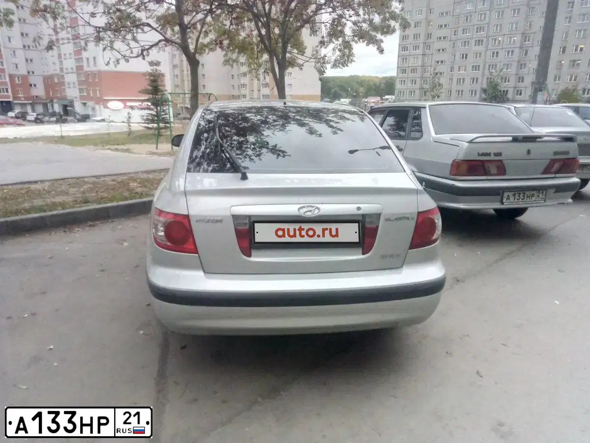 Фото автомобиля LADA 2115 SAMARA, 2001 — госномер А133НР21. Цвет: СЕРЕБРИСТЫЙ