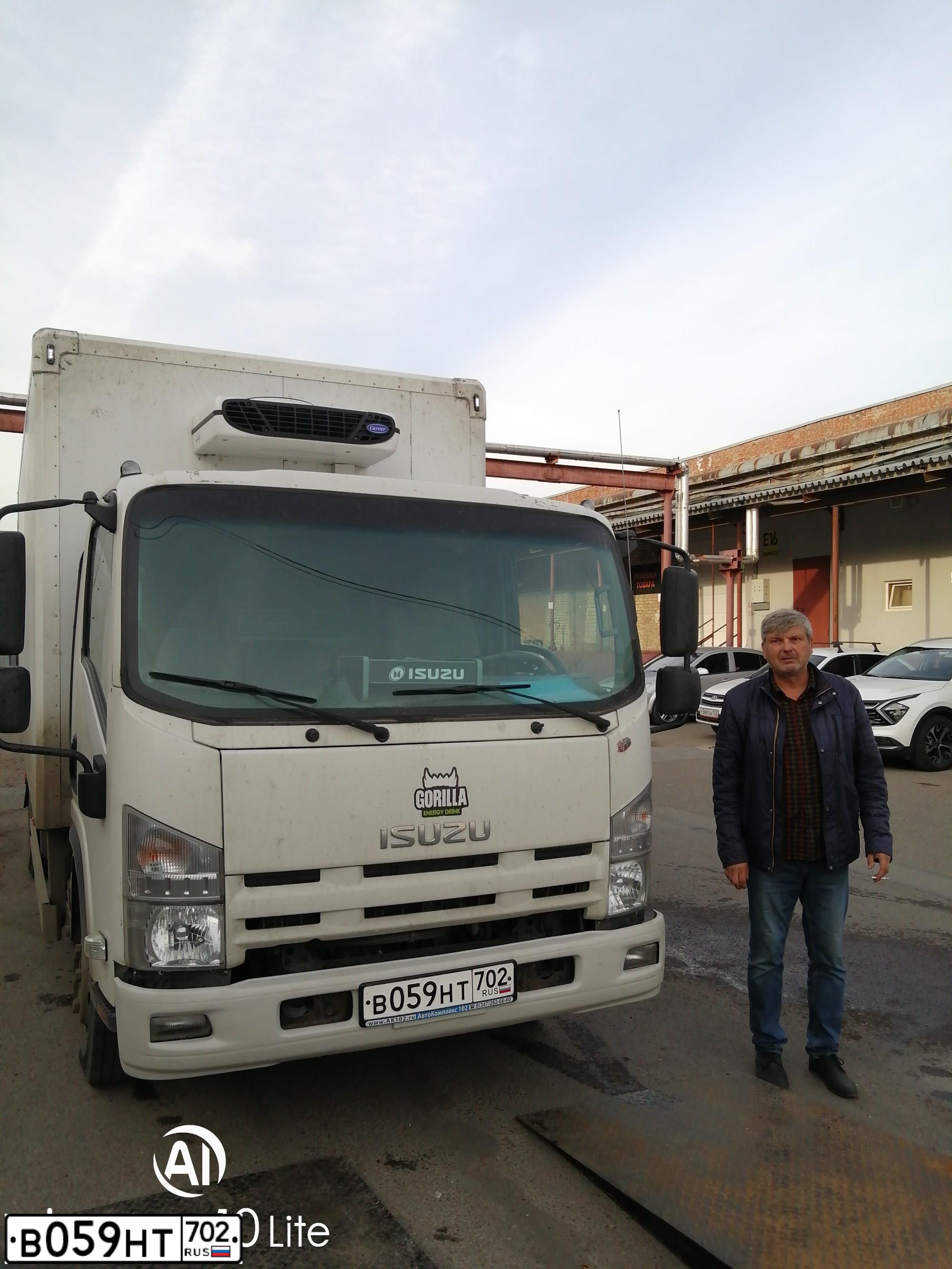 Фото автомобиля ISUZU NPR, 2016 — госномер В059НТ702. Цвет: Белый
