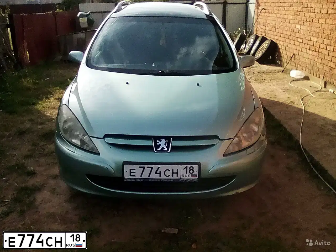 Фото автомобиля PEUGEOT T 307, 2002 — госномер Е774СН18. Цвет: СВЕТЛО-СЕРЫЙ