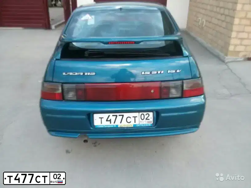 Фото автомобиля LADA 2112, 2004 — госномер В164ЕР156. Цвет: сине-зеленый