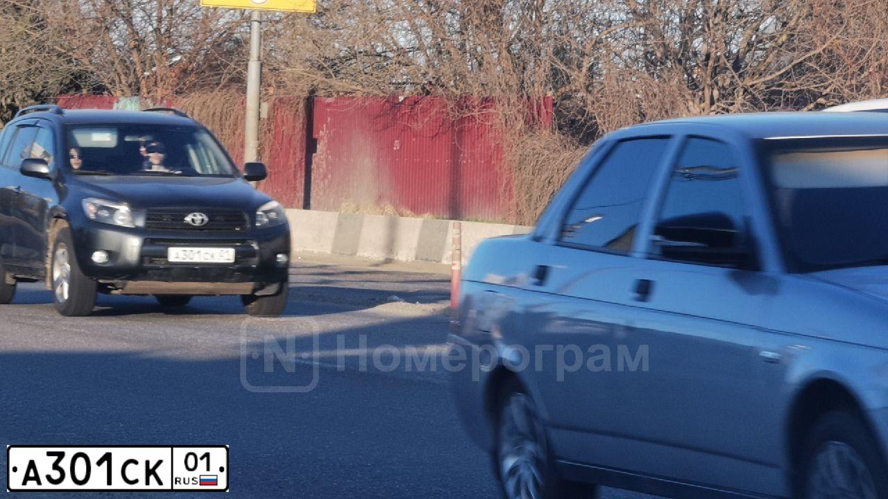 Фото автомобиля TOYOTA RAV4, 2006 — госномер А301СК01. Цвет: ТЕМНО-СЕРЫЙ
